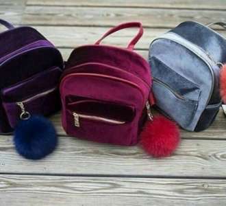 Velvet and leather backpacks