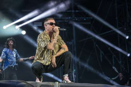 Une fan du rappeur Macklemore invitée à monter sur scène en plein concert, ce qui causera sa perte