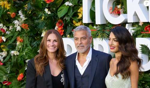 George et Amal Clooney : Couple rayonnant sur tapis rouge avec Julia Roberts, une grossesse annoncée