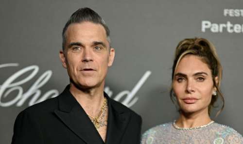 Robbie Williams grimace alors que sa femme le regarde avoir « badinage après badinage » |  Nouvelles des célébrités |  Showbiz et télévision