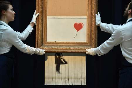La Fille au Ballon, œuvre autodétruite de Banksy, s'envole à 21,8 millions d'euros.
