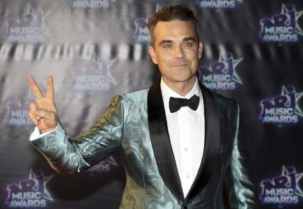 Deux Banksy de la collection de Robbie Williams s'arrachent à coups de millions à Londres