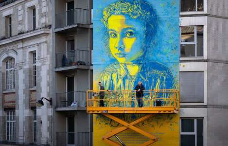 Le street artiste C215 peint «des sourires et de l’humanité» sur les murs d’Ukraine