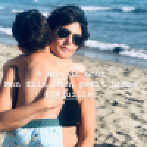 Faustine Bollaert : Moment câlin mère-fils à la plage avec son 
