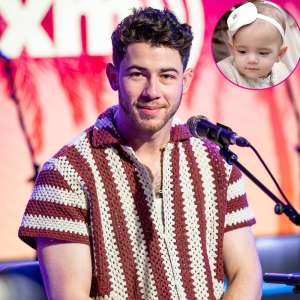 Nick Jonas embrasse le front de sa fille pendant le concert des Jonas Brothers